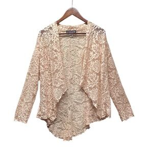 The Pyramid Collection open front lace shrug. Size Large. Light peach